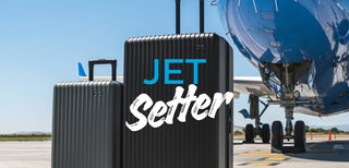 nomatic method suitcase luggage on runway plane