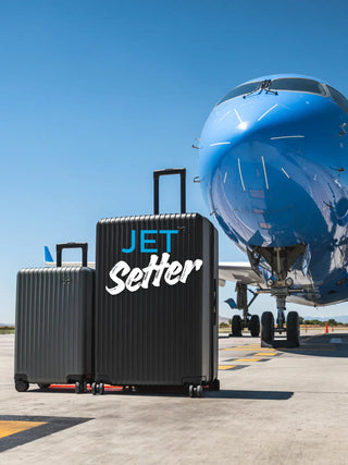 nomatic method suitcase airport runway with plane